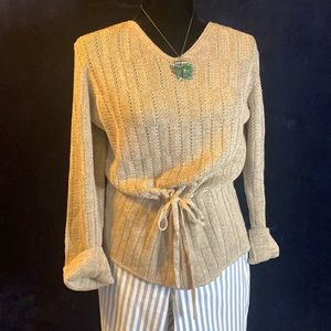 Cream colored crocheted sweater